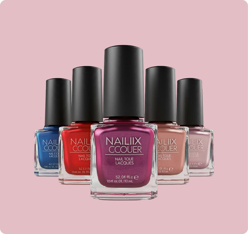 Five bottles of NailiX Cocoon nail polish arranged in a fan shape against a solid pink background. The center bottle is a shimmering magenta-pink, flanked by blue, red, nude, and dusty pink shades.